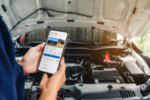 Book it Now_PR phone_at car