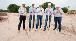 Groundbreaking of the Mark A. Carr Technology and Training Center on May 5. From left are Jacob Steele, Michael Allnutt, Donnie Carr, Michael Suttle, and Kye Grisham.