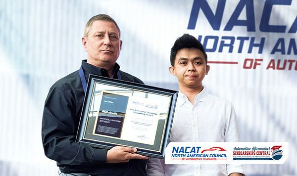 Ross Whiteley of Mitchell 1 presents the 2026 Automotive Technology Outstanding Student award to Lân Miêu at the recent Automotive Educators Conference.